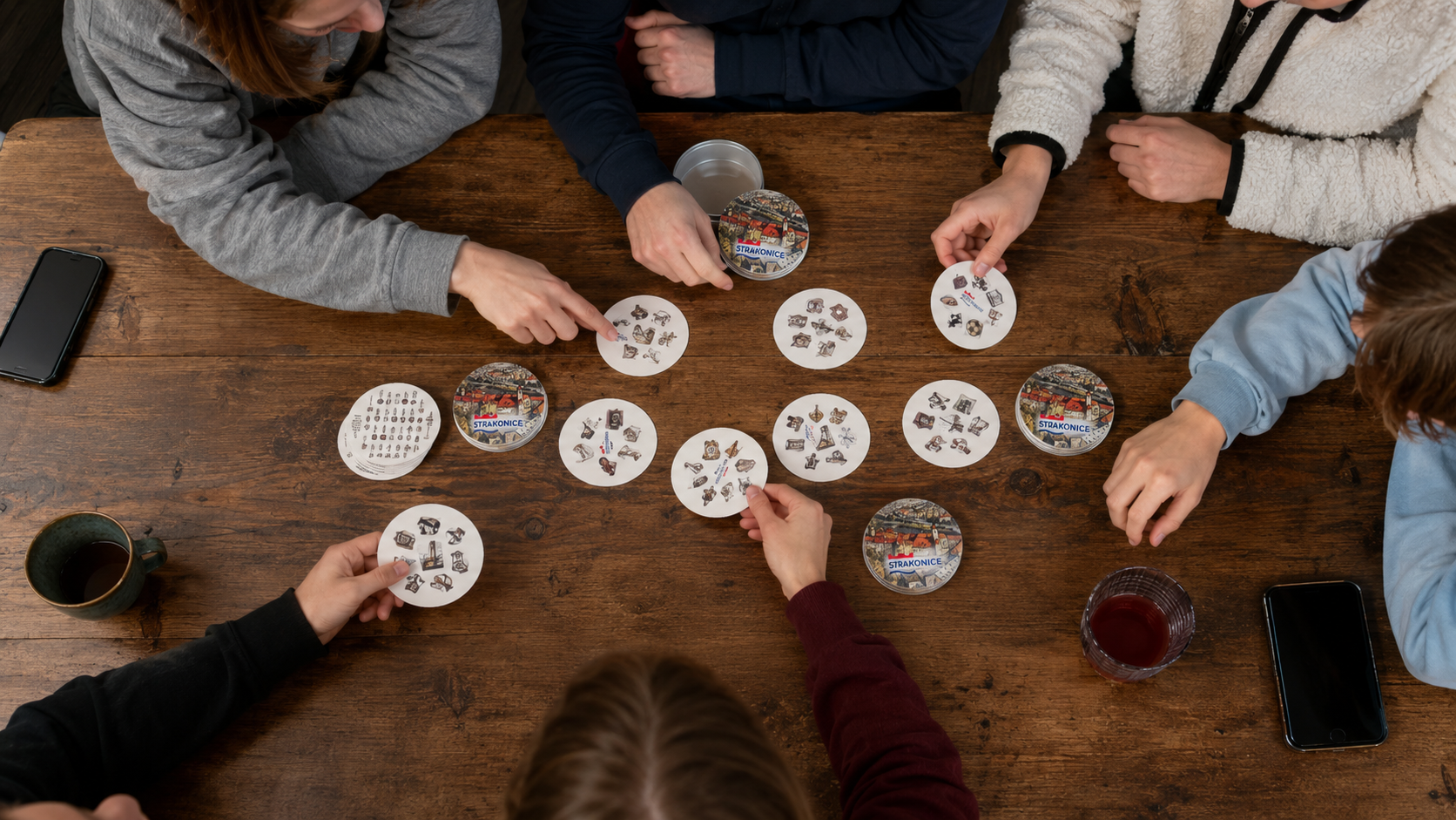 A group playing the Strakonice board game